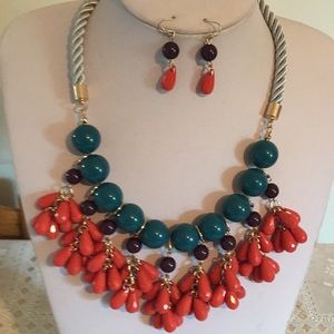 Orange and teal dangle necklace earring set